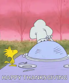 Snoopy serves turkey to Woodstock