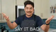 Man in kitchen says say it back