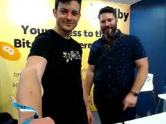 Two men at Bitcoin event