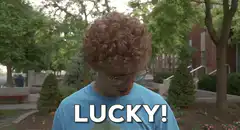 Lucky! Guy with curly hair