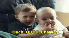 Toddler reacts to baby pulling his hair