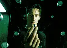 Neo catches and drops a bullet