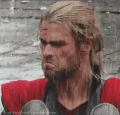 Thor grimacing in rain
