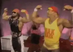 Hulk Hogan and Ultimate Warrior flexing
