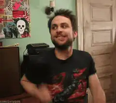 Charlie Day nodding and smiling