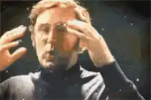 John Lennon exploding into a ring