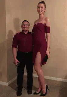 Tall woman in various dresses with short man