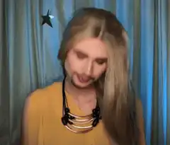 Blonde woman with mustache on phone