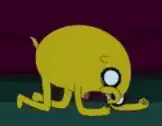 Jake the Dog eating a red object