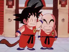 Goku pats Krillin's head