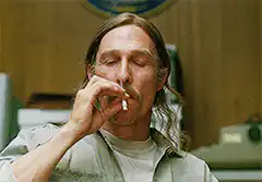 Matthew McConaughey smoking a cigarette