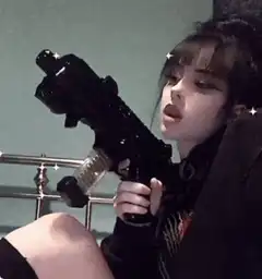 Girl with gun and sparkles