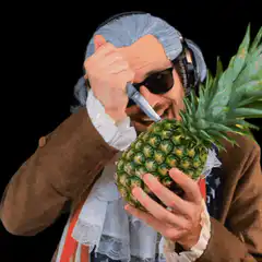 Man feeds pineapple face