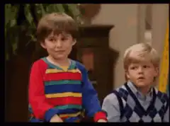 Two boys making funny faces