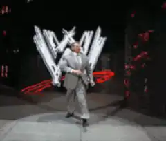 Vince McMahon walking on stage