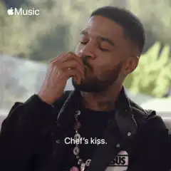 Usher chef's kiss