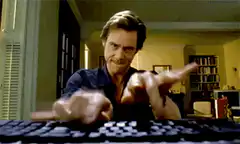 Willem Dafoe typing aggressively