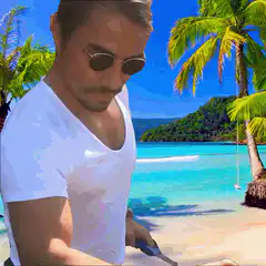 Man on beach with purple bubbles