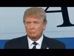 Donald Trump smirking and closing eyes