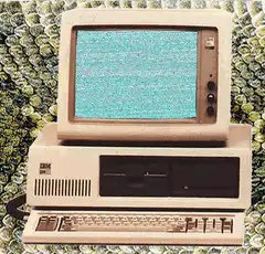Vintage IBM computer with static screen