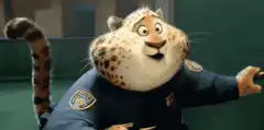 Clawhauser excitedly clasps his paws