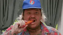 Danny Trejo eating a carrot