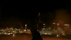 Silhouette dancing on rooftop at night