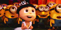 Agnes in a wedding dress with Minions