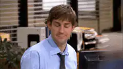 Jim and Pam high five in the office