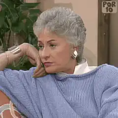 Woman resting chin on hand