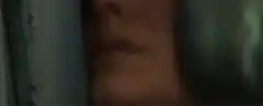 Woman's eye widens then explosion