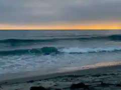 ocean waves at sunset