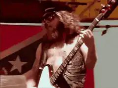 Lemmy Kilmister playing bass on stage