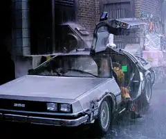 Doc Brown exits DeLorean in rain