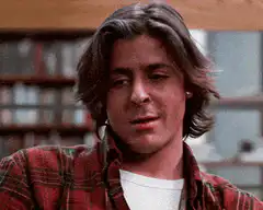 Joey Tribbiani smirking in library