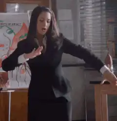 Christy Campbell dancing in office