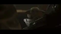 Baby Yoda holding a blaster