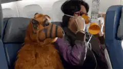 Alfonso Ribeiro as Alf on a plane