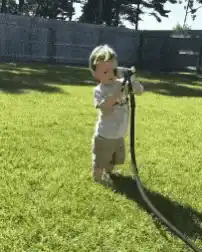 Toddler gets blasted by hose