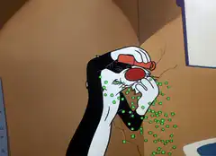 Sylvester the Cat gets hit with peas