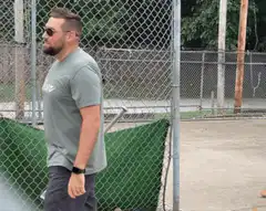 Man pointing at camera who's awesome