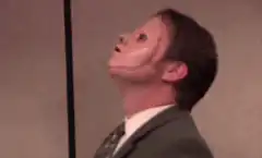 Dwight Schrute and Leslie Knope laughing