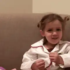 confused little girl in pajamas