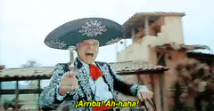 Man in sombrero shouting Arriba