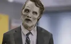Zombie man in suit shrugs