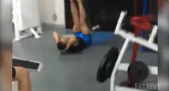 Man doing sit-ups in gym