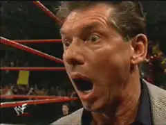 Vince McMahon and woman shocked faces