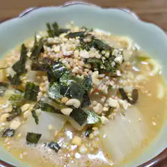 bowl of ramen with nori and garlic