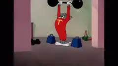 Tom lifting weights and dropping them