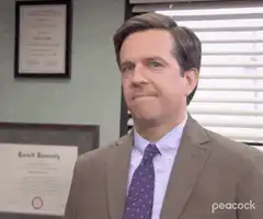 Ed Helms as Andy Bernard smirking and talking